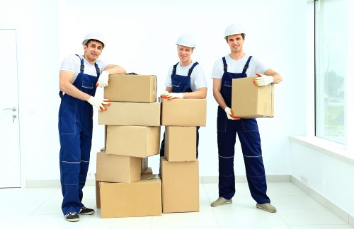 Team loading furniture safely into a van