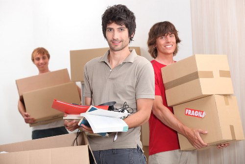 Loading boxes and furniture into a van for a local move