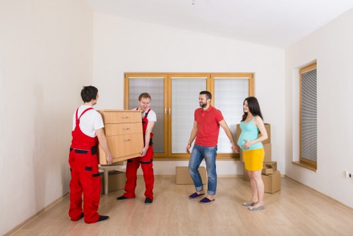 Commercial moving team preparing office equipment in Crayford