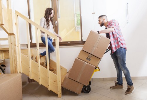 Office furniture being unloaded at a new workplace in Crayford