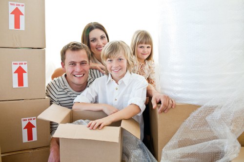 Local moving team packing household items with care in Crayford