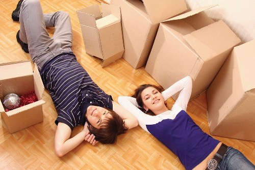 Local office moving team handling equipment and furniture