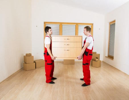 Packed business items and furniture ready for relocation in Crayford